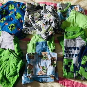 6 pairs of pajamas. 3 Minecraft pjs , 2 Star Wars pjs and 1 pair of Dino’s pjs.